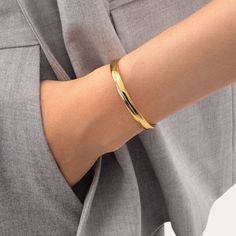 Stack this versatile slit bangle bracelet with your other bracelets for a subversive-basic addition to your look. The slit on the top gives it a contemporary two-tone appearance, revealing a minimalistic style that is never boring.  Band Width: 6mm Band Thickness: 2.8mm Material: 18k Gold & Rhodium Plated Basic Addition, Minimalistic Style, Bangle Designs, Cuff Bangles, Stylish Jewelry, Gold Jewelry Fashion