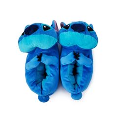 a pair of blue slippers sitting on top of each other