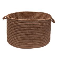 a brown rope basket on a white background