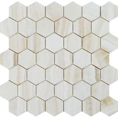 white marble hexagonal tile with an irregular pattern