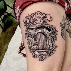 a woman's leg with a tattoo on it