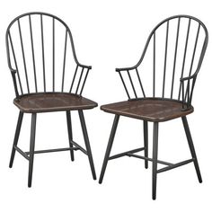 two black and brown chairs sitting next to each other