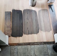 four different shades of wood are on the floor