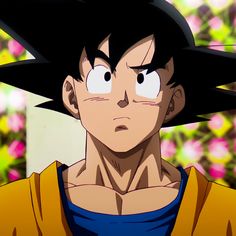 the young gohan is looking at something with his eyes wide open and black hair