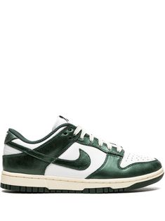 Dunk Low "Vintage Green" sneakers from NIKE featuring dark green, white, leather, signature Swoosh logo detail, embroidered logo to the rear, round toe, front lace-up fastening, logo patch at the tongue, branded insole and rubber sole. These styles are supplied by a premium sneaker marketplace. Stocking only the most sought-after footwear, they source and curate some of the most hard to find sneakers from around the world.. | Nike Dunk Low "Vintage Green" sneakers Nike Tenis, Dr Shoes, Sports Aesthetic, Green Sneakers, Nike Brand, Swoosh Logo, Nike Dunk Low, Sneaker Heels, Dunk Low