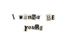 the words i wanna be yours written in cut out letters