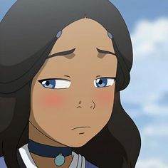 an animated image of a woman with blue eyes and black hair, staring at the camera