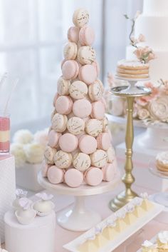 a cake made out of macaroons on a table