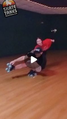 a man riding a skateboard on top of a hard wood floor in a gym