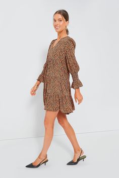 Meet one of our favorite silhouettes, the Kenzo Dress. Featuring feminine flutter smocked cuffs, a V-neckline, and a loose empire waist, this is the most flattering flirty frock! Pair this leopard mini with flats for a casual look or dress up with heels and statement earrings for date night. V-neckline Long sleeves Elasticated ruffle cuff Loose empire waist Tiered skirt Swing shape Mini length Crepe fabric Material: 100% Polyester Care: Machine wash cold Kenzo Dress, Cotton Poplin Fabric, Tier Skirt, Crepe Fabric, Tiered Skirt, Poplin Fabric, Cotton Poplin, Empire Waist, Day Dresses