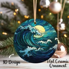 a christmas ornament with an ocean wave and the moon in the sky on it