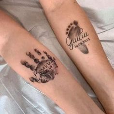 two people with matching tattoos on their legs that say gulua and don't touch