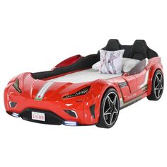 a red sports car bed is shown on a white background