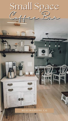 small space coffee bar with white furniture and wooden shelves on the wall, in front of a dining room table