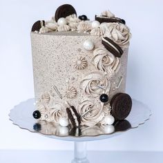 a white cake with cookies and cream frosting