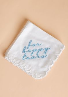 a white napkin with blue writing on it that says, now happy birthday dads