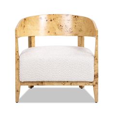 a wooden chair with a white cushion on it