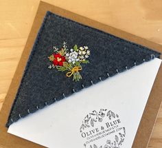 a close up of a piece of paper with flowers on it