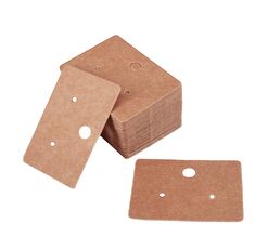 three pieces of cardboard with holes in the middle