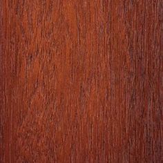 an image of wood grain textured with dark brown paint on the outside of it