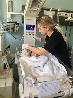 a woman in a hospital bed getting ready for surgery