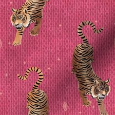 two tigers standing on top of a pink background