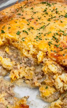 a casserole dish with meat and cheese on top