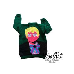 a green sweater with a cartoon character on it