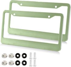 two green metal license plates with screws and nuts