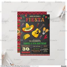 a fiesta themed birthday party with an acoustic guitar and sombrero on the front