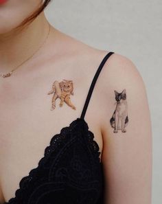 a woman with two cats on her shoulder and one cat on her arm, both in different colors