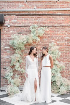 two brides in front of a pink and white baby's breath floral ceremony backdrop in Brooklyn New York Lesbian Wedding Outfits, Lesbian Wedding Photography, Comfortable Wedding Dress, Wythe Hotel, Wedding Outfits For Women, Nyc Elopement, City Bride, Romantic Photography, Beach Wedding Dress Boho