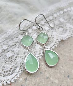 "Mint pale Earring,Pistachio Green Bridal Earring,Teardrop Earring,Holiday Gift,Mint Bridesmaid Earring,Light Green Wedding Jewelry ♥ All my items are made to each order, and are made in small series! This listing is for 1 pair of earrings: Classic styled Earrings: awesome feminine faceted bezel set (Silver plated) simple Drops in pale mint pistachio green color glass, in Rhodium plated ear wires - lovely chic look ! Perfect to a lovely wedding, as Bridesmaid Gifts and every day waer! *Rhodium p Elegant Light Green Earrings As Gift, Elegant Light Green Drop Earrings, Elegant Light Green Earrings For Gift, Green Drop Earrings For Bridesmaid Gift, Elegant Green Hypoallergenic Teardrop Earrings, Green Teardrop Jewelry For Bridesmaid Gift, Light Green Wedding, Green Wedding Jewelry, Light Green Earrings