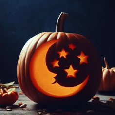 a carved pumpkin with stars on it