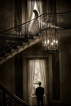 a man standing in front of a staircase with the words marry now written on it