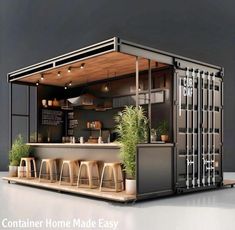 the container home made easy is designed to look like a shipping container with seating and counter space