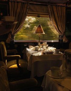 there is a table set for two in the dining car