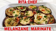 a white dish filled with cooked eggplant covered in cheese and herbs next to the words, rita chef melanze marinae