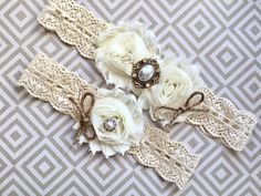 "Rustic wedding garter, rustic garter set - wedding garter, bridal garter - burlap and lace, vintage rustic garter Handmade with love, this garter set was designed especially for a rustic wedding. A combination of vintage stretch lace, chiffon blossoms, antique centerpieces and burlap accent bows create the stunning rustic look brides are searching for. ------CUSTOMIZE YOUR GARTER----- Please leave COLOR SELECTIONS and NEEDED ARRIVAL DATE in the \"note to seller\" box at checkout. To see shabby Antique Centerpieces, Garters For Wedding, Garter Set Wedding, Bride Garter, Bridal Garter Lace, Bridal Garters Set, Woodsy Wedding, Wedding Garter Set, Wedding Garters