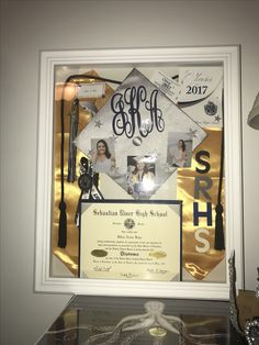 a graduation collage is framed in a white frame with gold foil and black lettering