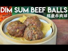 two meatballs are in a bowl with noodles