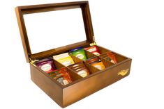 a wooden box filled with different types of condiments