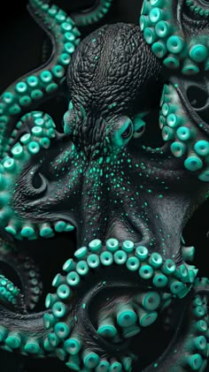 an octopus sculpture is shown in green and black