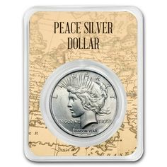 the peace silver dollar in its package