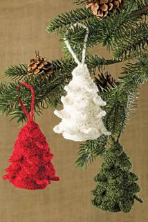 three knitted christmas ornaments hanging from a pine tree with cones on the top and bottom