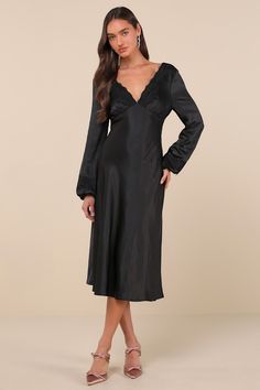 The Lulus Illustrious Elegance Black Satin Long Sleeve Midi Dress is stunning, sweet, and will sweep everyone off their feet! Sleek, stretch-woven satin shapes this stunning dress that features a lightly gathered bodice with a plunging, lace-trimmed V-neck and back, all framed by long balloon sleeves with matching lace trim and elastic at the cuffs. The chic, empire-style waist sits atop the fit-and-flare silhouette that falls to a modern midi hem. Hidden back zipper/clasp. Fit: This garment fit Sleek Fitted Long Sleeve Satin Dress, Satin V-neck Night Dress, Elegant Fitted Long Sleeve Satin Dress, Stretch Satin Knee-length Dress, Stretch Knee-length Satin Dress, Sleek Satin Long Sleeve Dresses, Night V-neck Dress With Satin Finish, Fitted V-neck Satin Dress With Bias Cut, Fitted Silk Dress With Satin Finish And V-neck