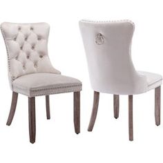 two white chairs sitting side by side in front of each other on a white background