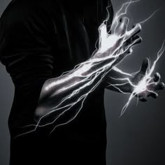 a man is holding his hands with lightning in the background