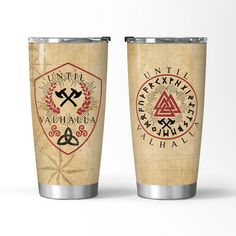 two travel mugs with viking symbols on them