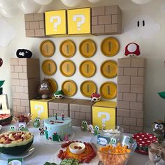 a mario birthday party with food and decorations